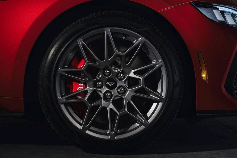 2024 Ford Mustang® model with a close-up of a wheel and brake caliper | Keyser & Miller Ford Inc in Collegeville PA